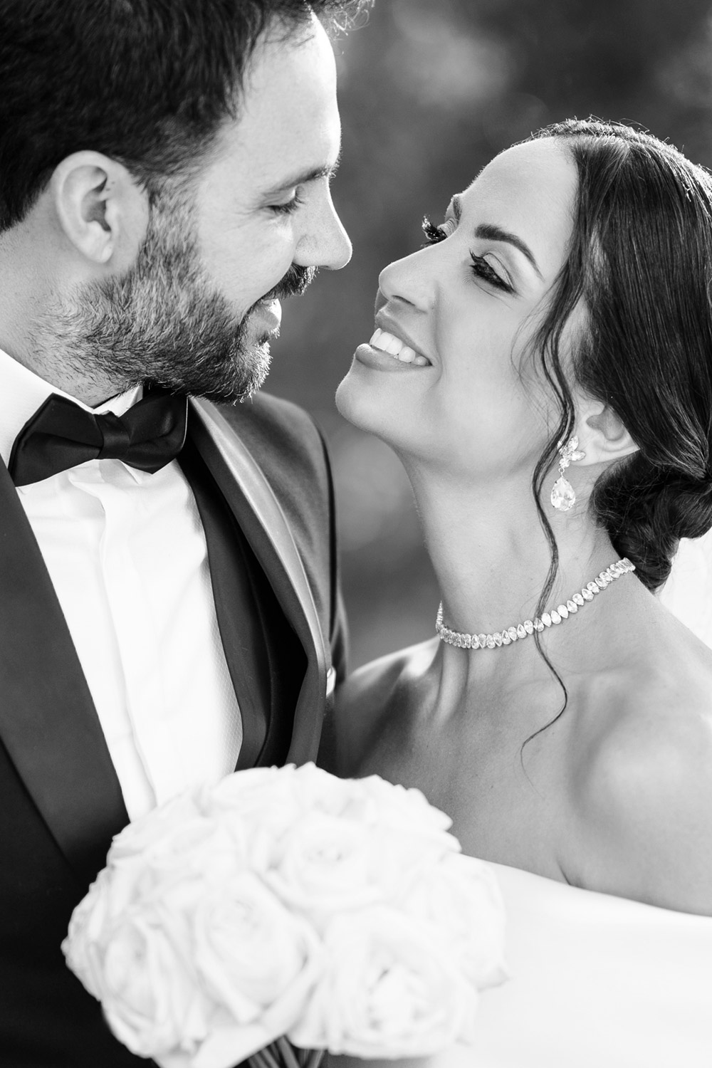 bride and groom looking at each other