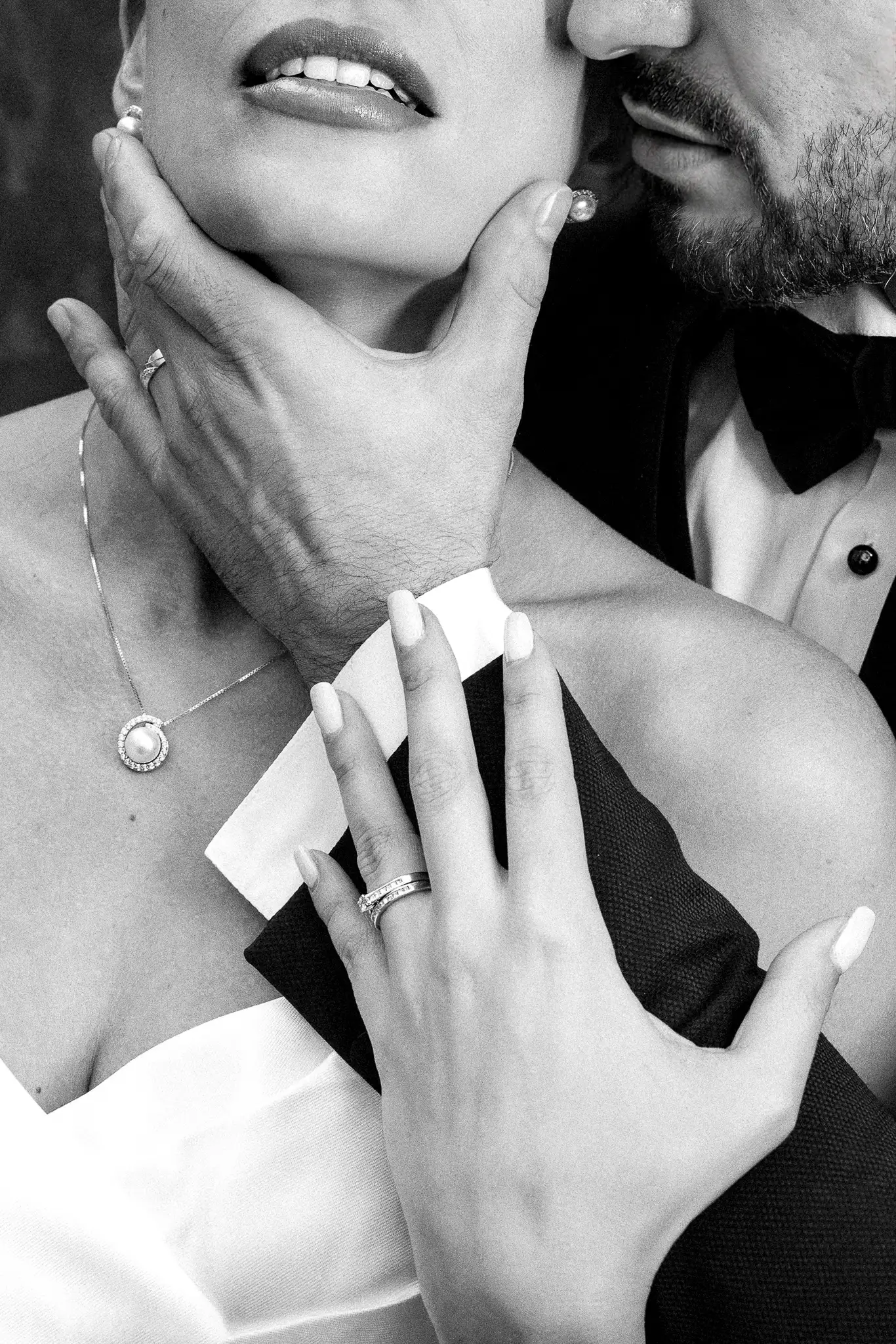 Intimate detail of hands and a gentle touch. Luxury wedding editorial Hotel Passage Brno.