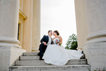 Prague wedding photographer newlyweds sitting on the stairs
