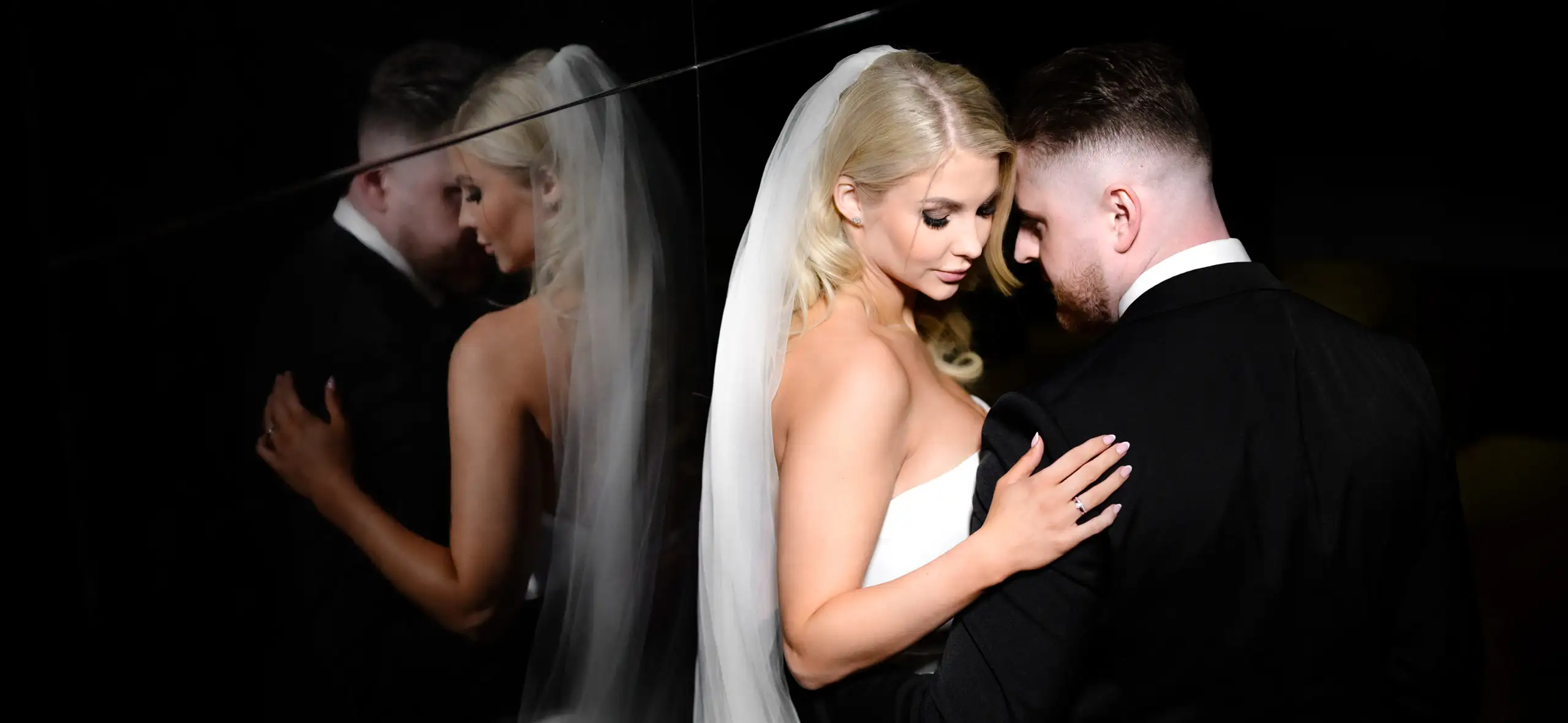 Artistic wedding portrait of a bride and groom with a creative reflection – Czech Wedding Photographer Jindrich Nejedly