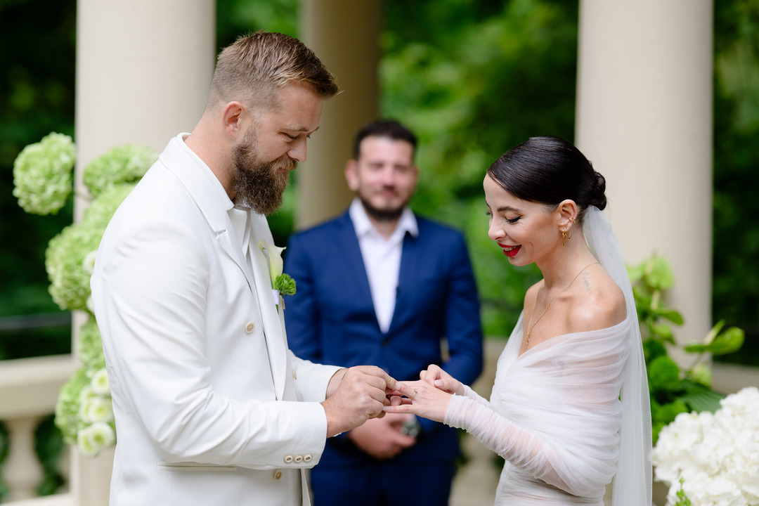 Fashion designer Debbie Brown's wedding – the bride exchanges her wedding rings with the groom.
