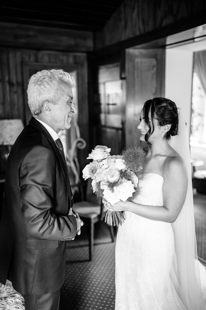 A touching moment between the bride and her father, photographed by wedding and portrait photographer Jindřich Nejedlý.

