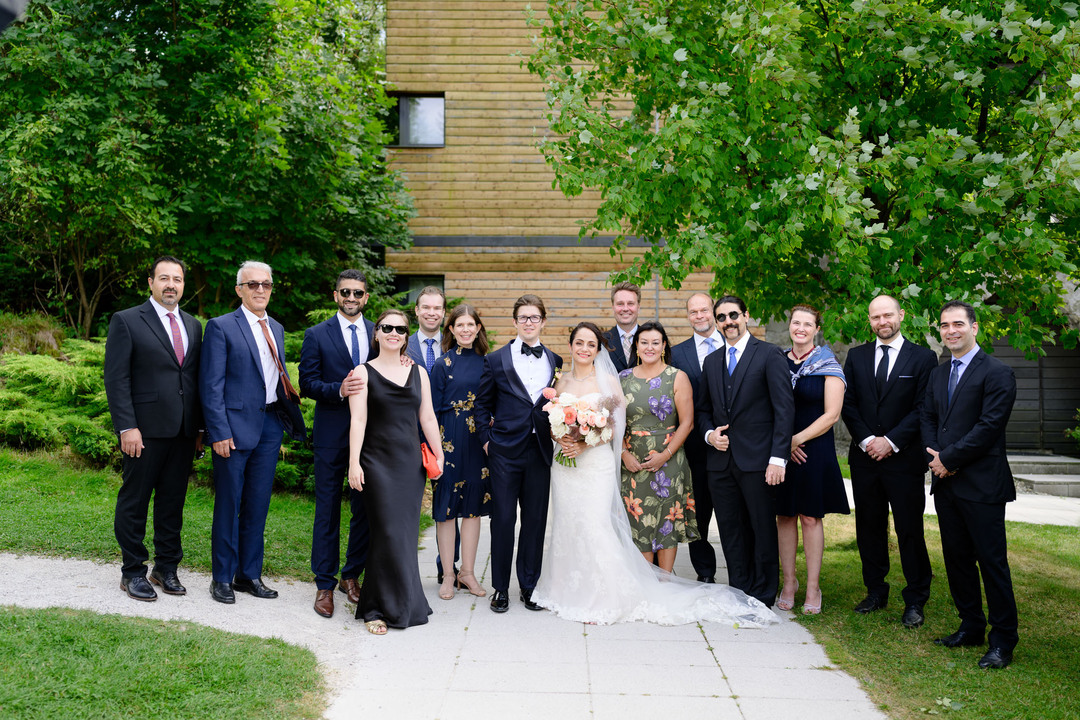 Group photographs of wedding guests in front of Hotel & Garden U Holubů, Beskydy, photographed by Jindřich Nejedlý.
