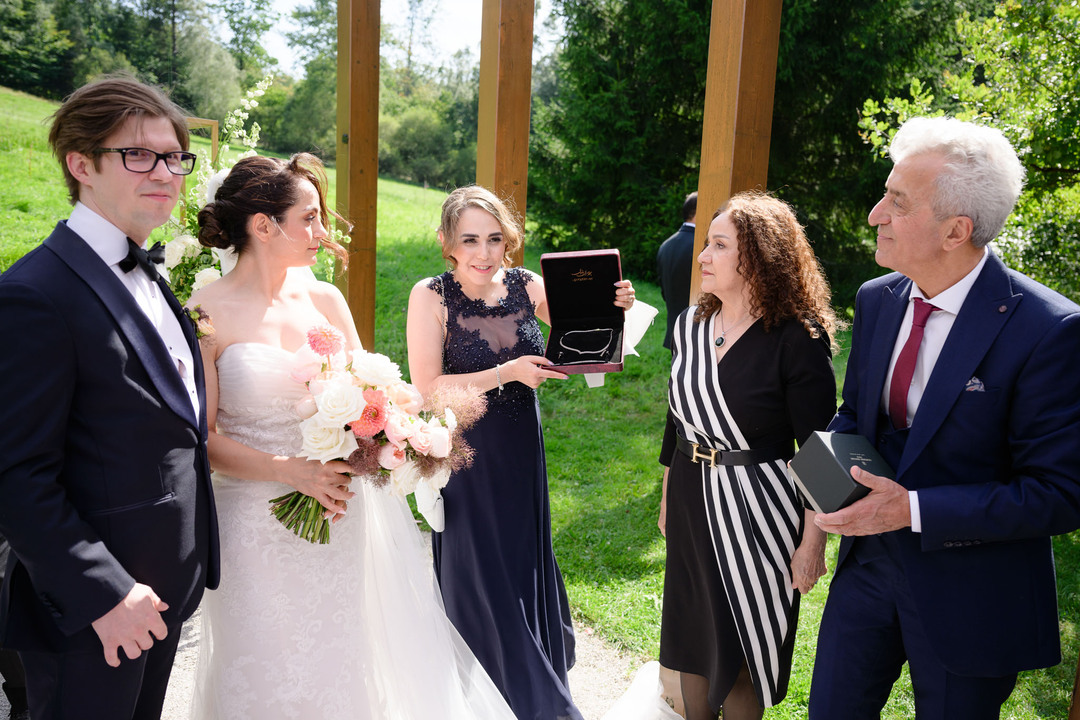 Loved ones congratulating the happy couple.