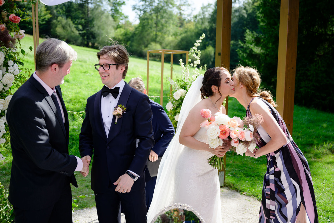 Guests and family offering congratulations to the newlyweds
