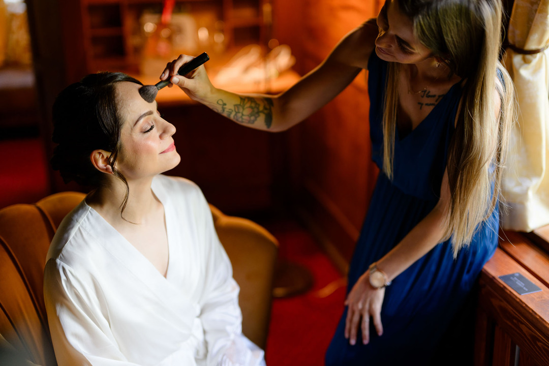 Bride’s preparations in a room at U Holubů, photographed by Jindřich Nejedlý.
