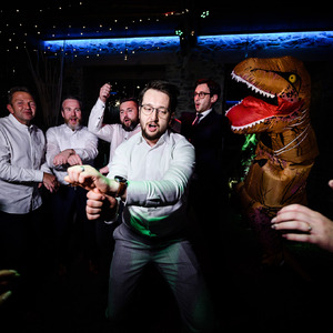 wedding party with dinosaur in Prague wedding venue