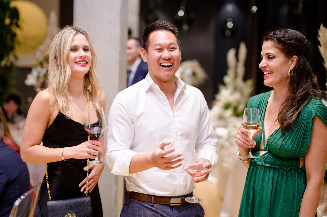 Evening wedding reception at Obelisk Winery, guests enjoying the celebration under soft lighting.