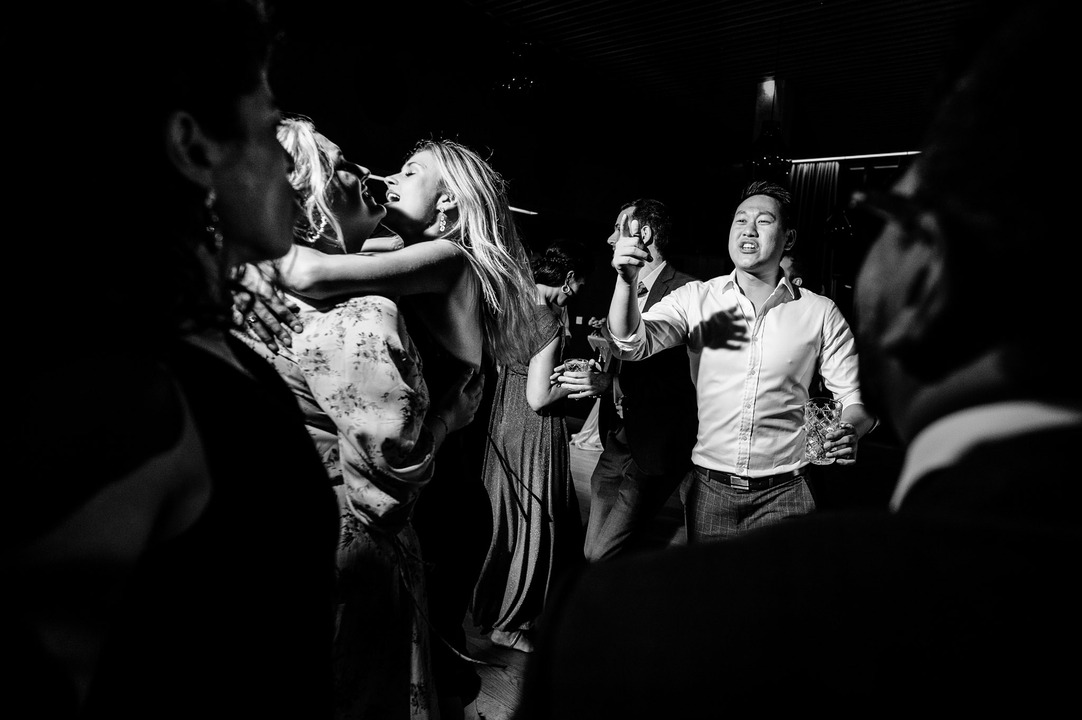 The dance floor is alive with energy, as guests dance, smile and celebrate together.