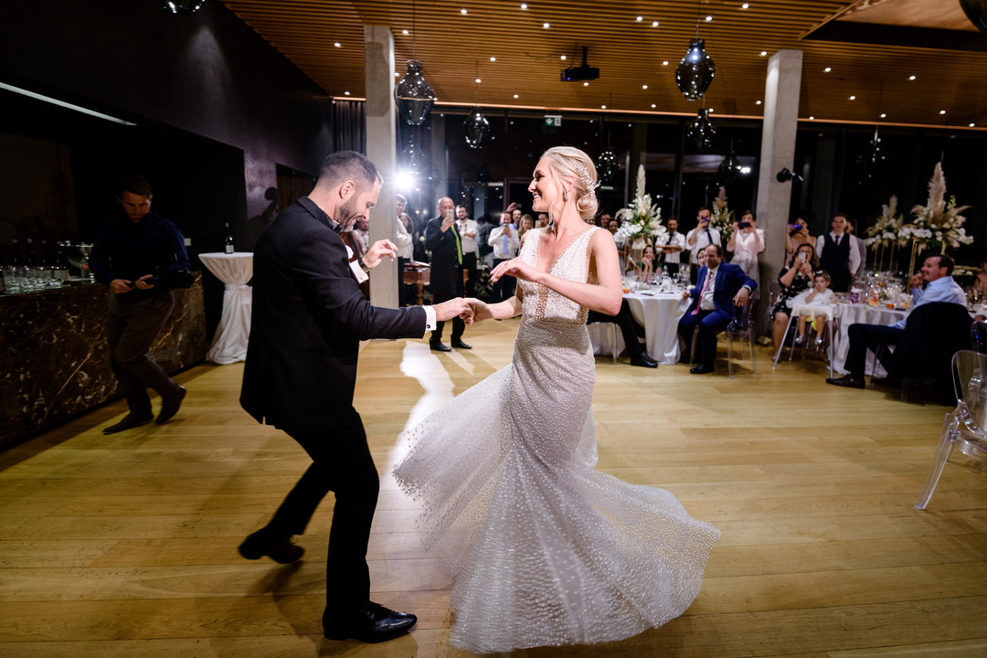 The bride and groom dancing at their wedding reception in Obelisk Winery.